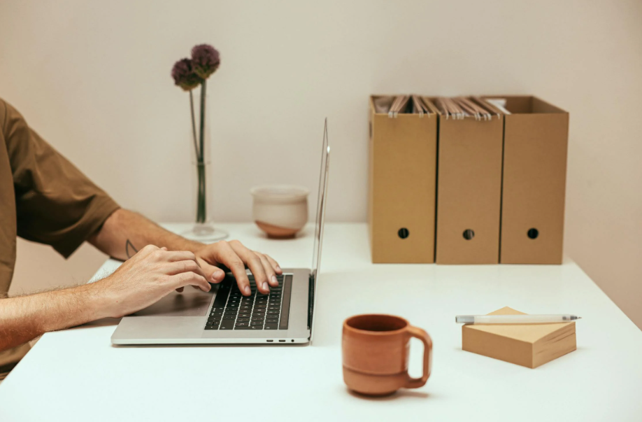 A person drinking Chaga mushroom coffee.